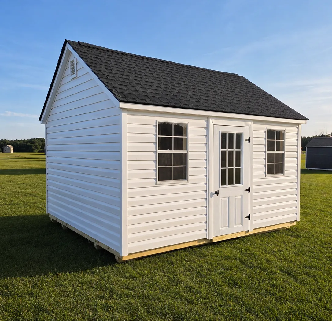White vinyl lap siding upgrade with architectural shingles on an A-Frame shed